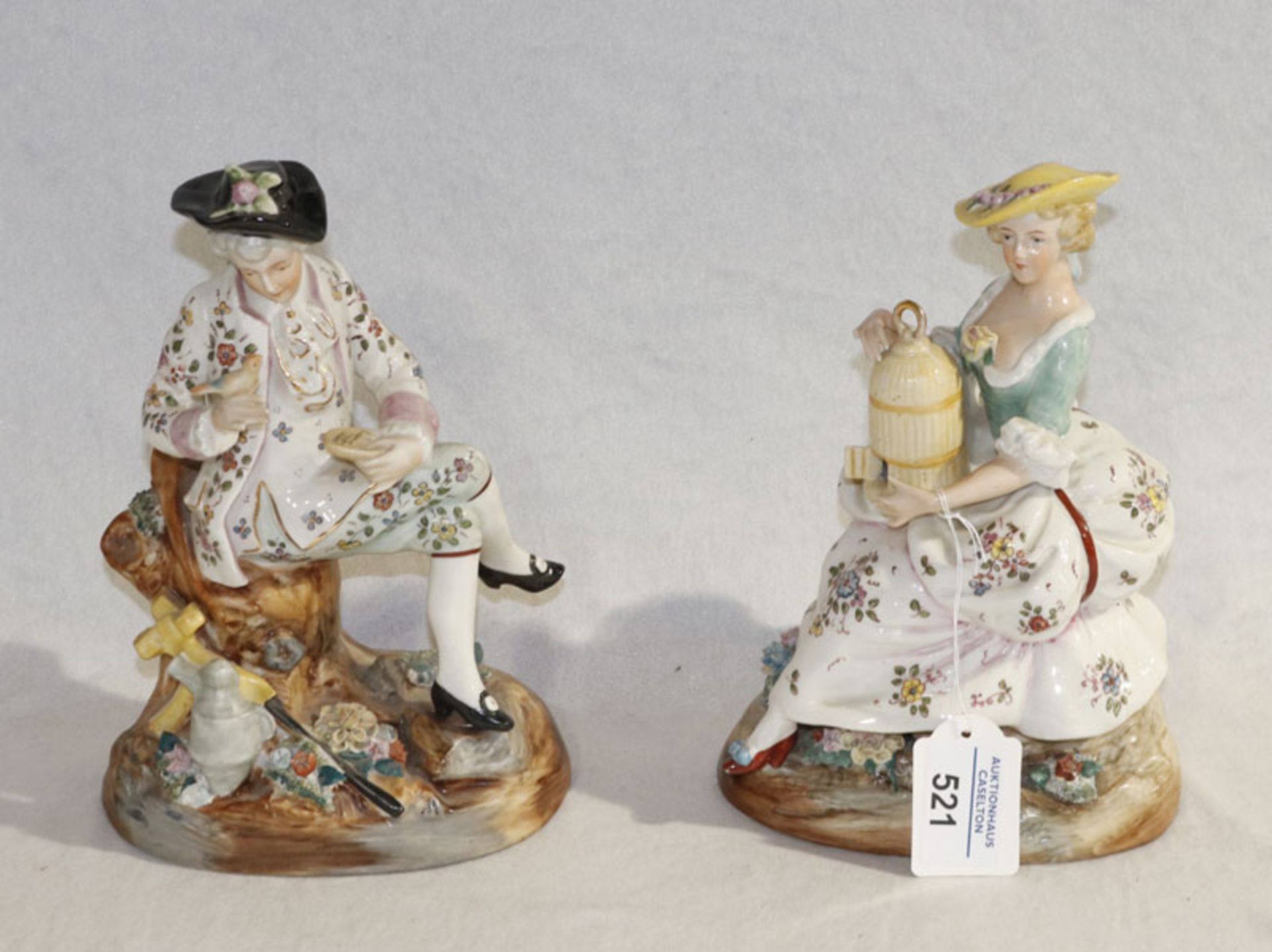 Paar Porzellanfiguren 'Vogelhändler', polychrom bemalt, leicht bestossen, 2 Finger fehlen, H 22