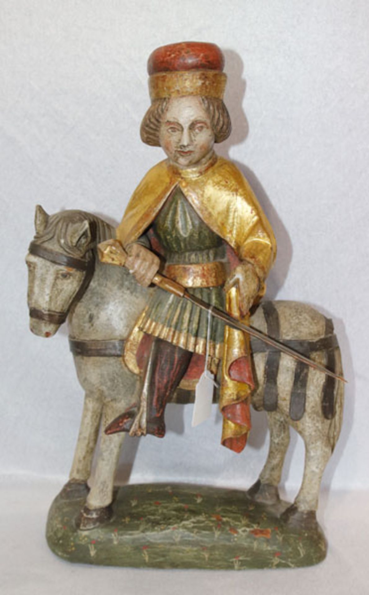Holz Figurenskulptur 'Heiliger Martin auf Pferd', farbig gefaßt, bestossen, Fassung beschädigt, H 50