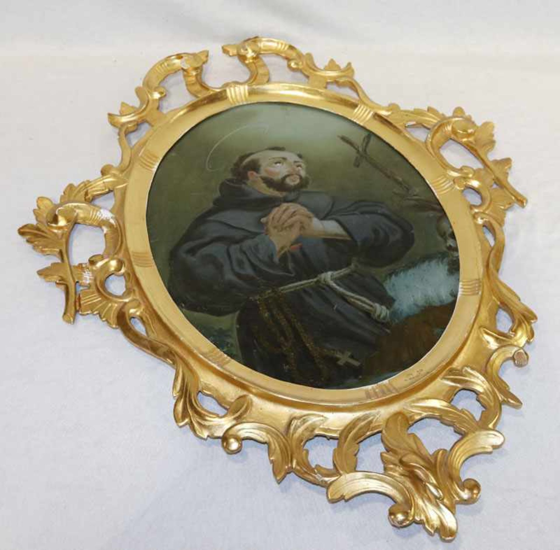 Hinterglasbild 'Hl. Antonius', wohl Augsburg, 19. Jahrhundert, in dekorativ geschnitztem Rahmen,