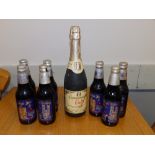 Seven bottles of Courage Silver Jubilee Ale and a bottle of 1987 Commemorative Taunton Cider. (8)