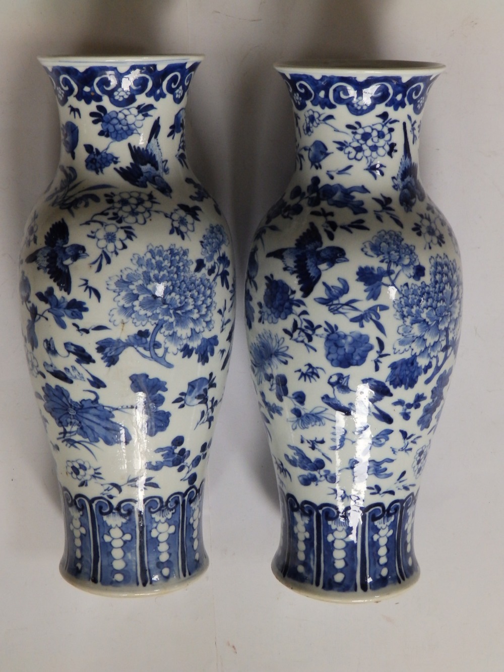 A pair of Chinese blue & white porcelain vases of shouldered form, decorated with scattered motifs - Image 2 of 9