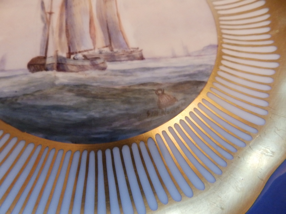 A 19thC porcelain plate painted with a scene depicting sailing vessels to central roundel within a - Image 2 of 3