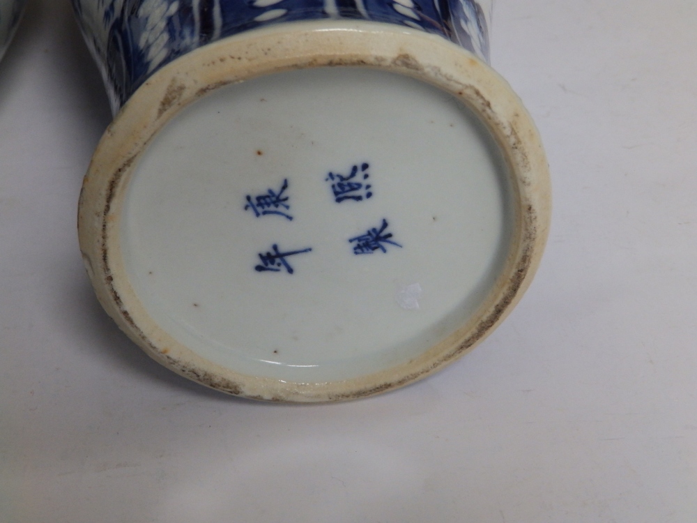 A pair of Chinese blue & white porcelain vases of shouldered form, decorated with scattered motifs - Image 3 of 9