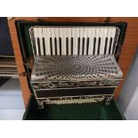 A Settimio accordion in case.