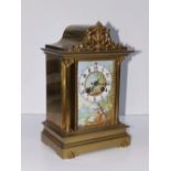 A 19thC French brass cased eight day gong striking mantel clock, the rectangular porcelain dial