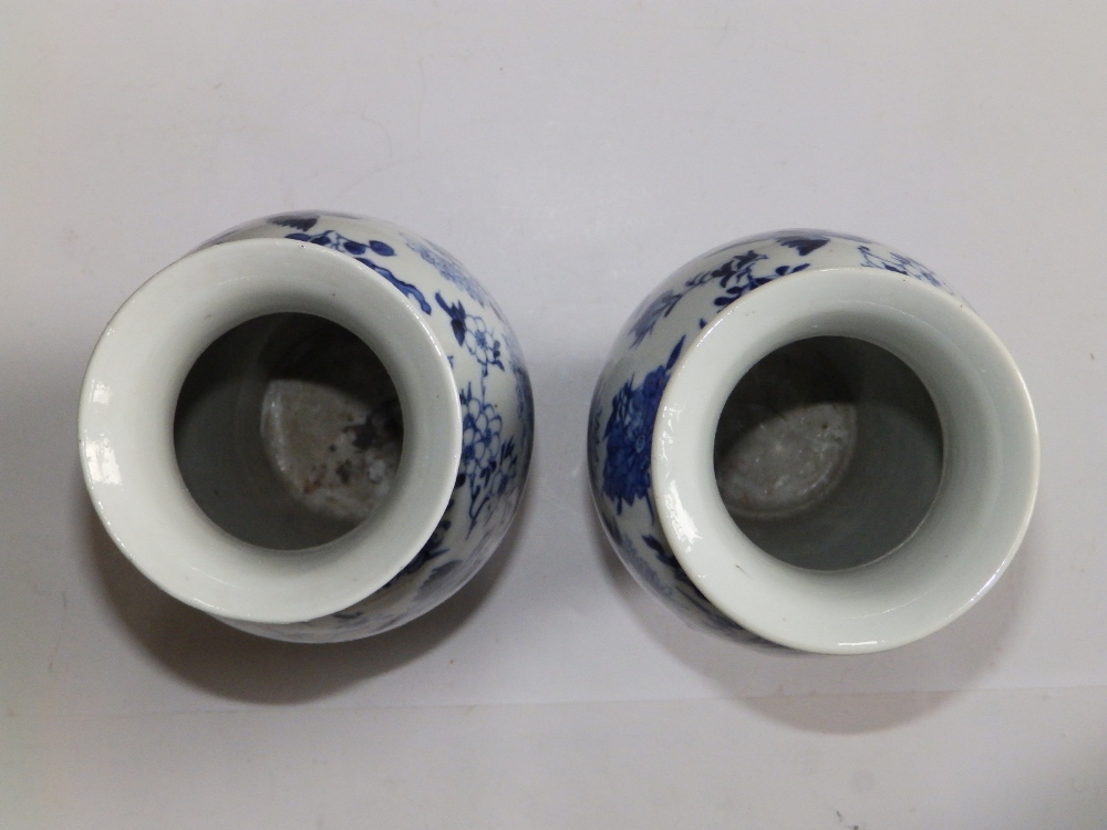 A pair of Chinese blue & white porcelain vases of shouldered form, decorated with scattered motifs - Image 5 of 9