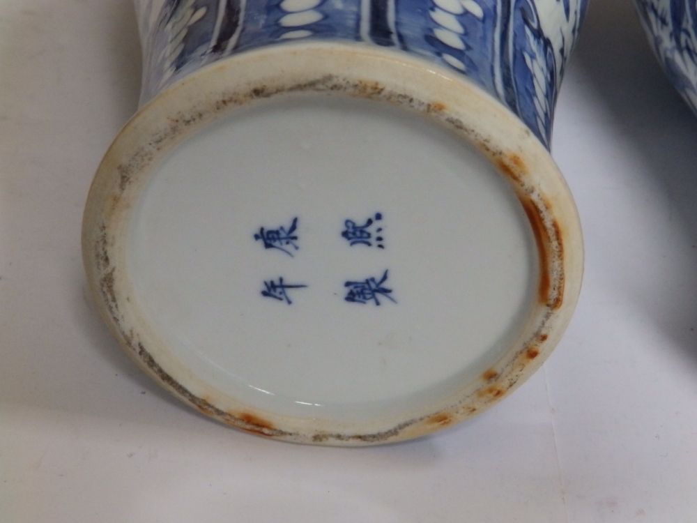 A pair of Chinese blue & white porcelain vases of shouldered form, decorated with scattered motifs - Image 4 of 9