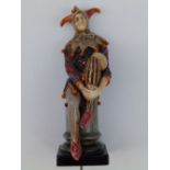 A Royal Doulton Jester HN1702, 10" - currently used as a lamp, minor losses to costume, hairline