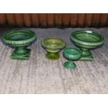 A pair of green glazed Dartmouth Pottery urns by Elaine Goddard and two others. (4)