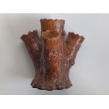 A Newton Abbot earthenware tree trunk vase.