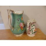 A Victorian floral painted ewer and a smaller jug decorated with pink lustre and a stag to side -