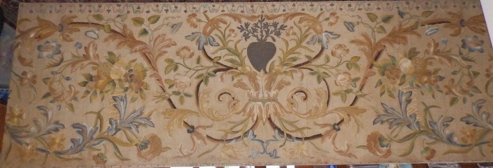 A large late 18th/early 19thC silkwork embroidered panel depicting The Sacred Heart to centre within