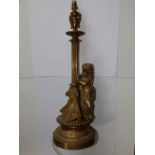 A Victorian figural brass table lamp modelled with a putto - Hunt & Co, 20" - converted to