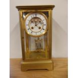 A French four-glass mantel clock with mercury compensated pendulum - dial cracked.