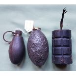 Three British WWI hand grenades.