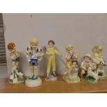 A Royal Worcester Doughty figure - 'Young Farmer' and five other Worcester figures of children