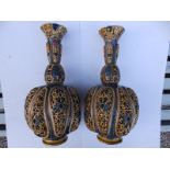 A pair of Zsolnay reticulated vases , 15" high - restored rims.