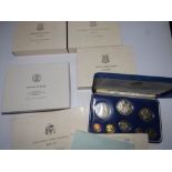 Five cased Franklin Mint Proof coins sets - Virgin Islands (3), Belize & Barbados.