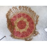 A silk embroidered circular occasional table cover and a modern cushion. (2)