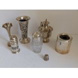 A 'Sterling' timble, two small silver vases, two condiment pieces and two other items. (7)