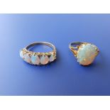 A five stone graduated opal ring set small diamonds - central opal chipped and a solitaire 18ct opal