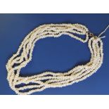 A five strand pearl necklace comprised of irregular shaped pearls, , 15".