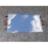 An art deco style chrome wall mirror, Width 34".