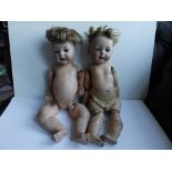 Two Kestner bisque head baby dolls - one with cracked head having sleeping glass eyes, jointed