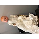 An Armand Marseilles bisque head baby doll.