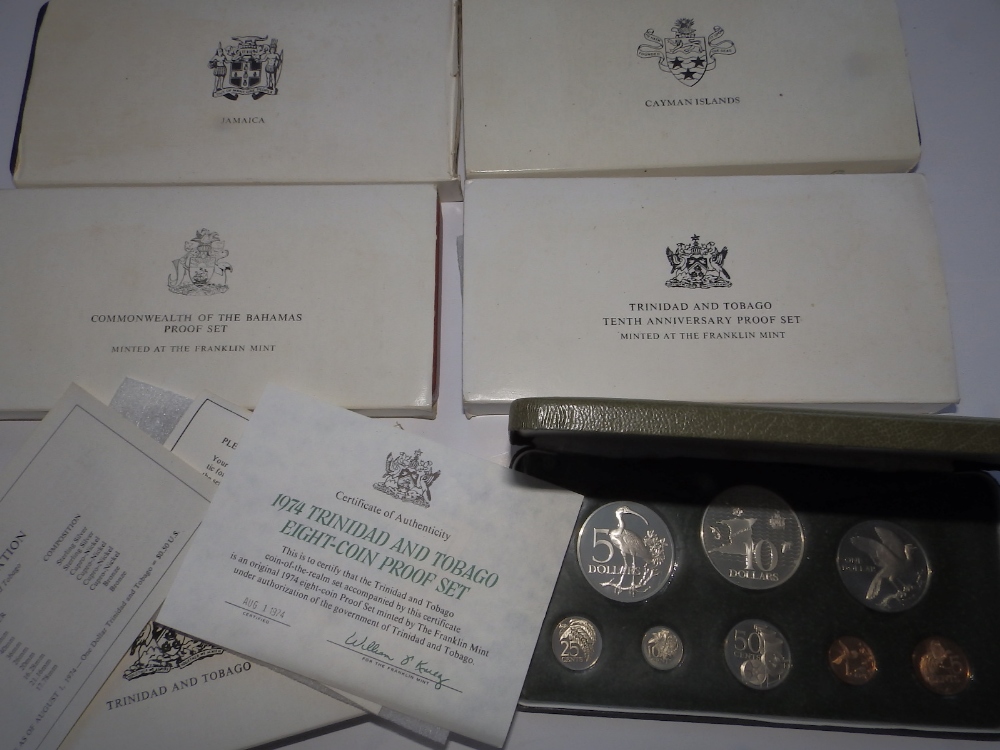 Five cased Franklin Mint Proof coin sets - Trinidad & Tobago (2), Bahamas, Cayman Islands &