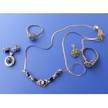 Two modern gem set cluster rings, a sapphire pendant with earrings and a 9ct gem set necklace. (6)