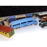 A boxed Matchbox Car Transporter, a boxed Garage, a Tank Transporter and five Models of