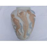 A white ground three colour frosted glass vase decorated with a moulded design depicting