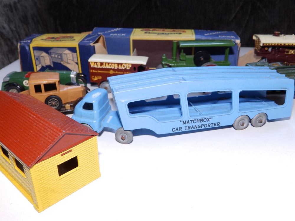 A boxed Matchbox Car Transporter, a boxed Garage, a Tank Transporter and five Models of - Image 2 of 4