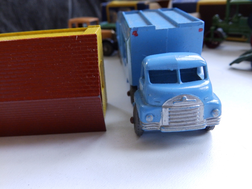 A boxed Matchbox Car Transporter, a boxed Garage, a Tank Transporter and five Models of - Image 4 of 4