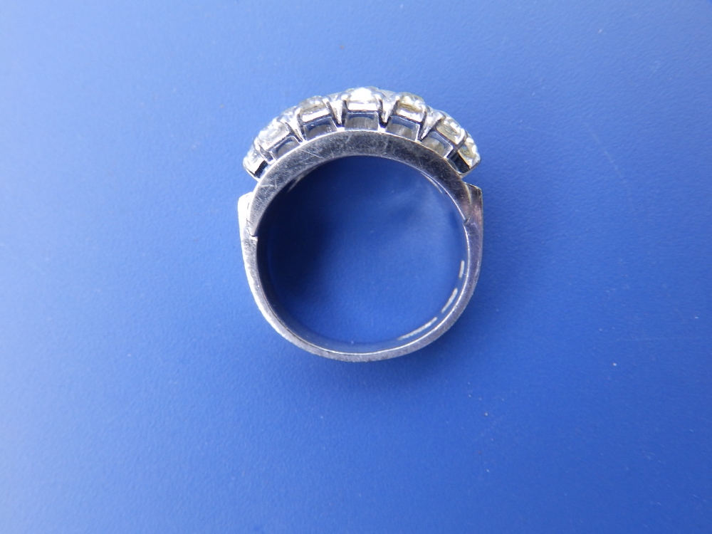 A modern Chinese diamond set '18k' white metal ring, the 16 brilliants slightly off white in - Image 2 of 2