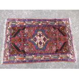 A small Hamadan rug, 29" x 43.5".