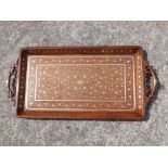An Indian Hoshiapur brass-inlaid wooden tray, 27" across handles.