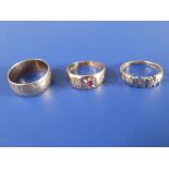 An 18ct gold gypsy set ring and two 9ct rings. (3)