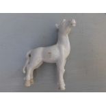 A Chinese white glazed porcelain horse, 3.5" high and four other damaged horses. (5)