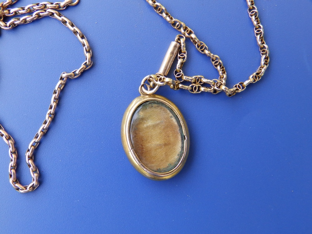 Two yellow metal necklace chains and an oval locket. (3) - Image 2 of 2