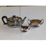 A three piece late Victorian presentation bachelor's tea service - 'Revd. Benskin, Hammersmith'