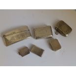 A Regency Birmingham silver snuff box -'IS' 1819, 2.25" across , two vestas and three other