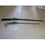 Two antique Arab muskets, 69" & 58".