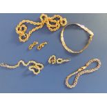A modern 9ct rope twist necklace, a bracelet, two pairs of rope twist earrings, a three-colour