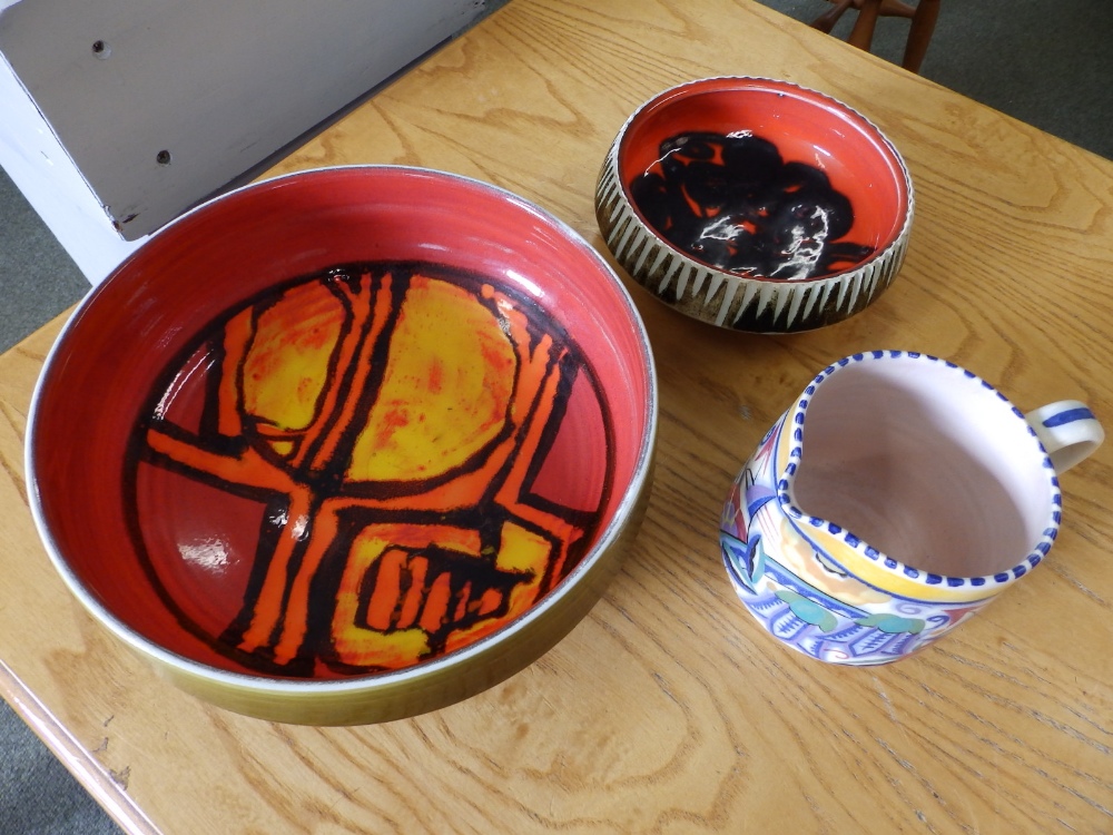 A Poole Delphis fruit bowl by Carol Cutler, a Poole milk jug - 'XP' decorated bluebells and one