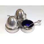 A Victorian 'acorn' silver condiment set on stand - Charles Favell, Sheffield 1878.