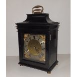 An 18thC ebonised bracket clock, the twin fusee movement with anchor escapement and bell striking,