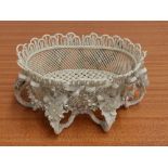 A Belleek porcelain basket - incomplete.