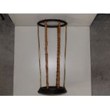A brass & simulated bamboo frame umbrella stand by Artis of Birmingham, 20" high.